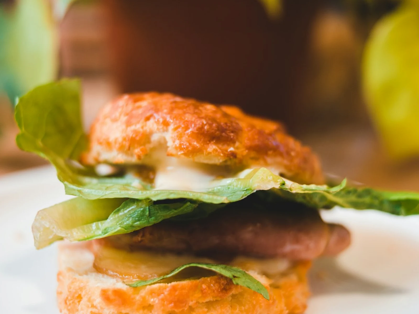 Bacon, Egg & Cheese Biscuit on white paper napkins.