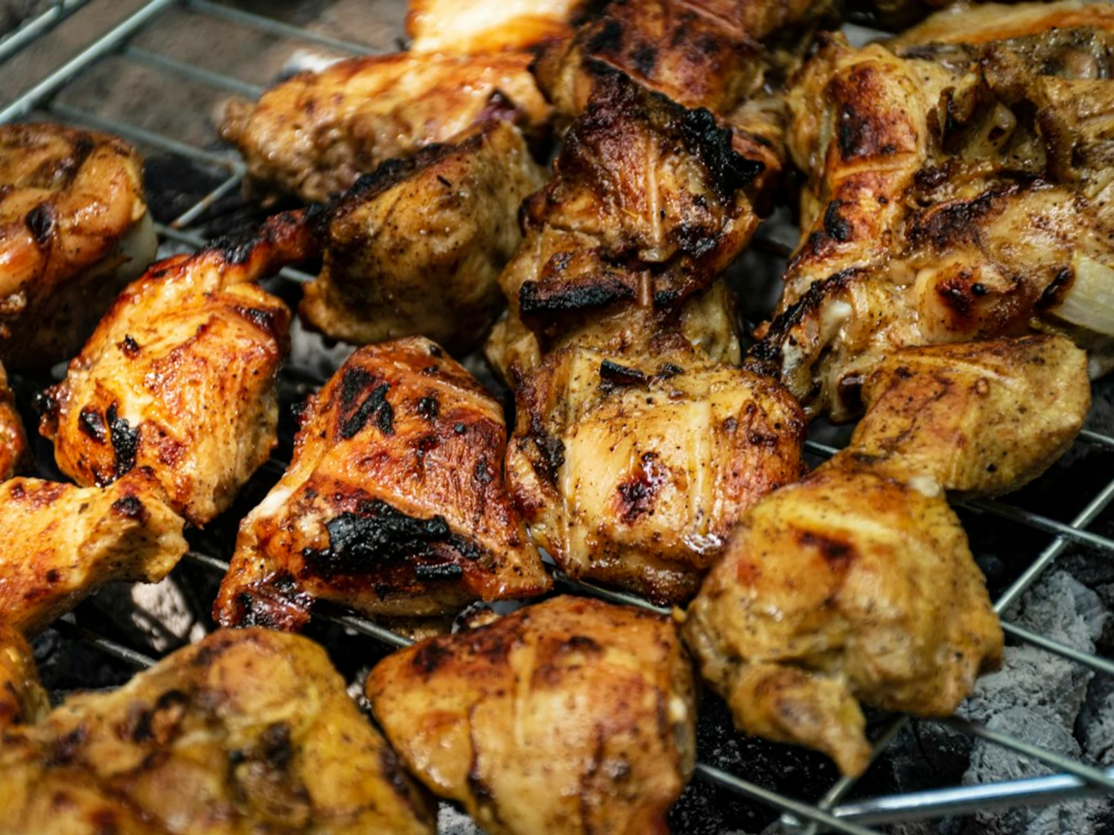 30-count Grilled Nuggets on a platter with stacked sauced options